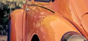 orange Volkswagen Beetle